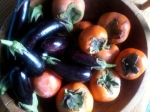 bowl of persimmons and baby eggplant